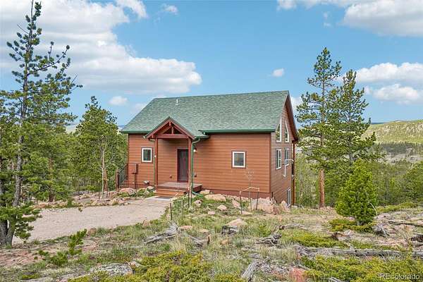 1.55 Acres of Land with Home for Sale in Red Feather Lakes, Colorado