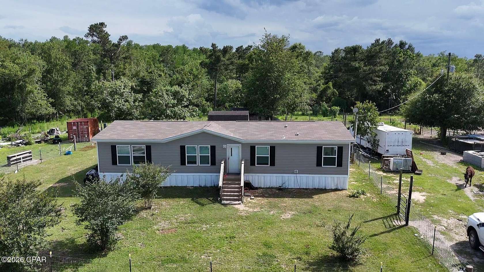 61 Acres of Land with Home for Sale in Marianna, Florida