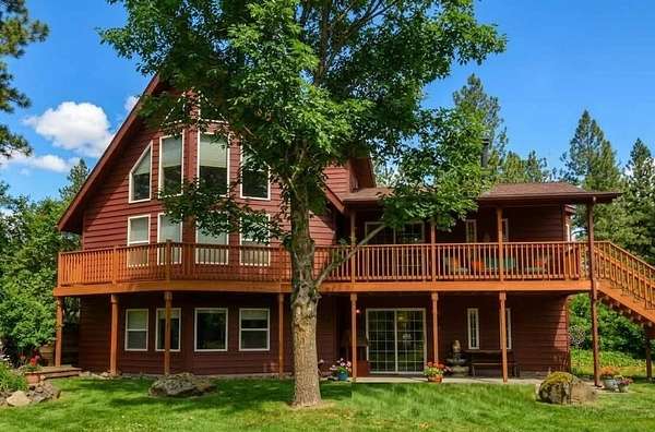 5.87 Acres of Land with Home for Sale in Nine Mile Falls, Washington