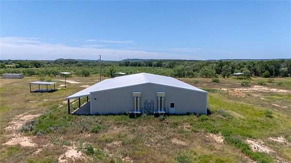 23.9 Acres of Land with Home for Sale in Mingus, Texas