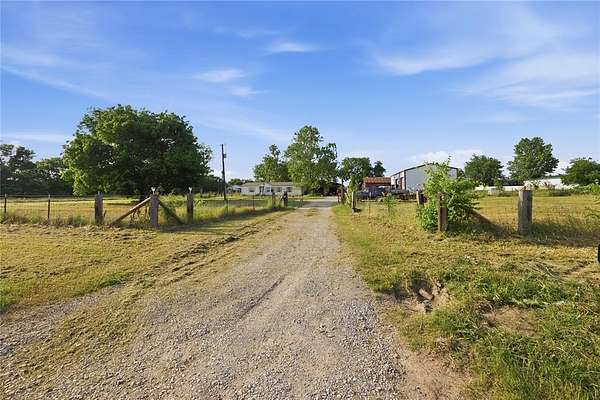 7.47 Acres of Land with Home for Sale in Denison, Texas