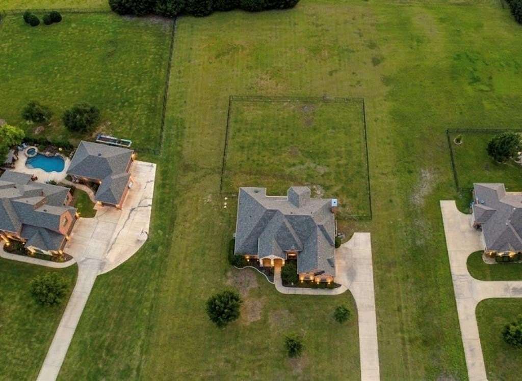 1.5 Acres of Land with Home for Sale in McLendon-Chisholm, Texas