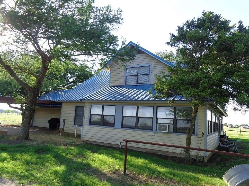 11 Acres of Land with Home for Sale in Grandview, Texas