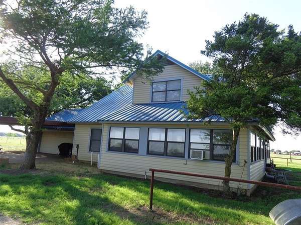 11 Acres of Land with Home for Sale in Grandview, Texas