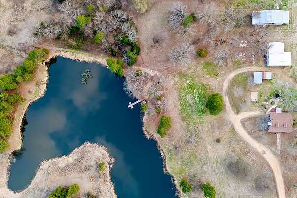 21.1 Acres of Land with Home for Sale in Powderly, Texas