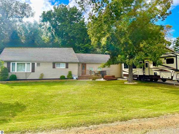 2 Acres of Land with Home for Sale in Perrinton, Michigan
