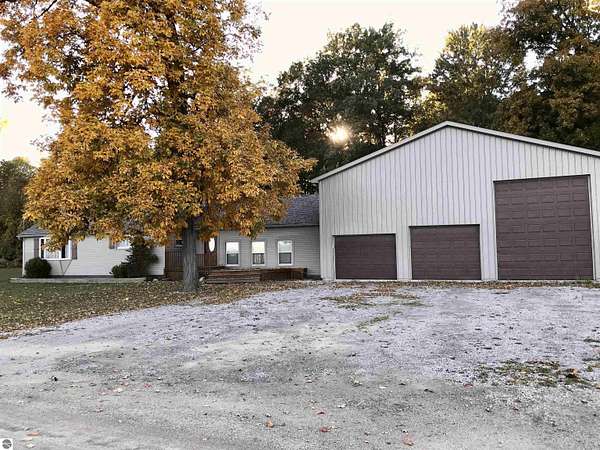 2 Acres of Land with Home for Sale in Perrinton, Michigan