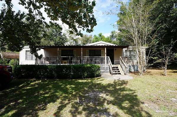 1.6 Acres of Land with Home for Sale in Pace, Florida
