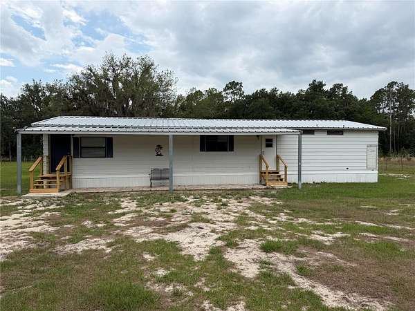 1.64 Acres of Land with Home for Sale in Polk City, Florida