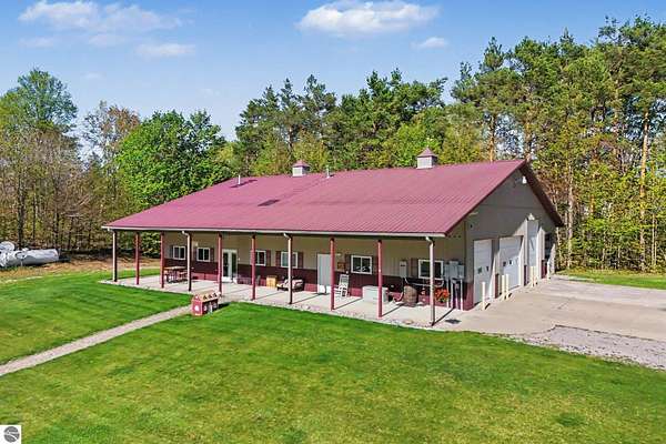20 Acres of Recreational Land with Home for Sale in Mancelona, Michigan