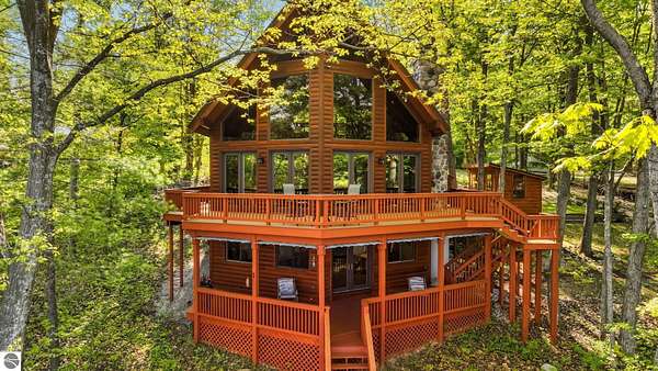 3 Acres of Land with Home for Sale in Mancelona, Michigan