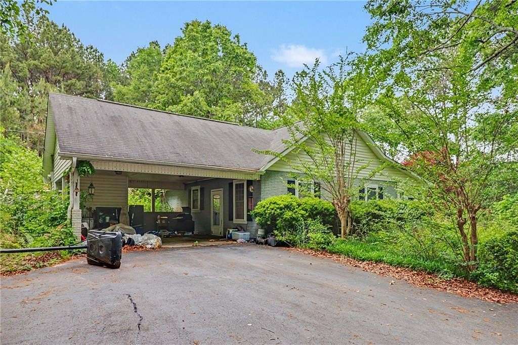 4 Acres of Land with Home for Sale in Sugar Valley, Georgia