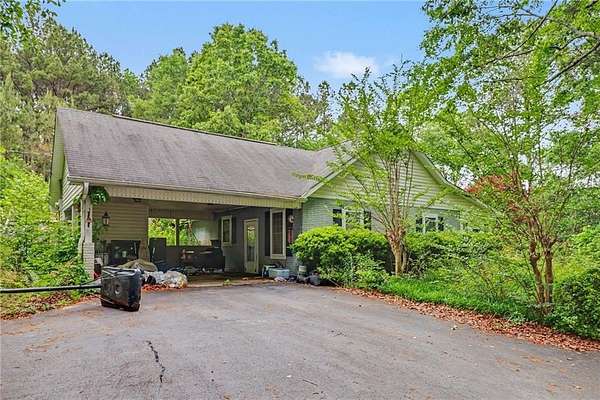 4 Acres of Land with Home for Sale in Sugar Valley, Georgia