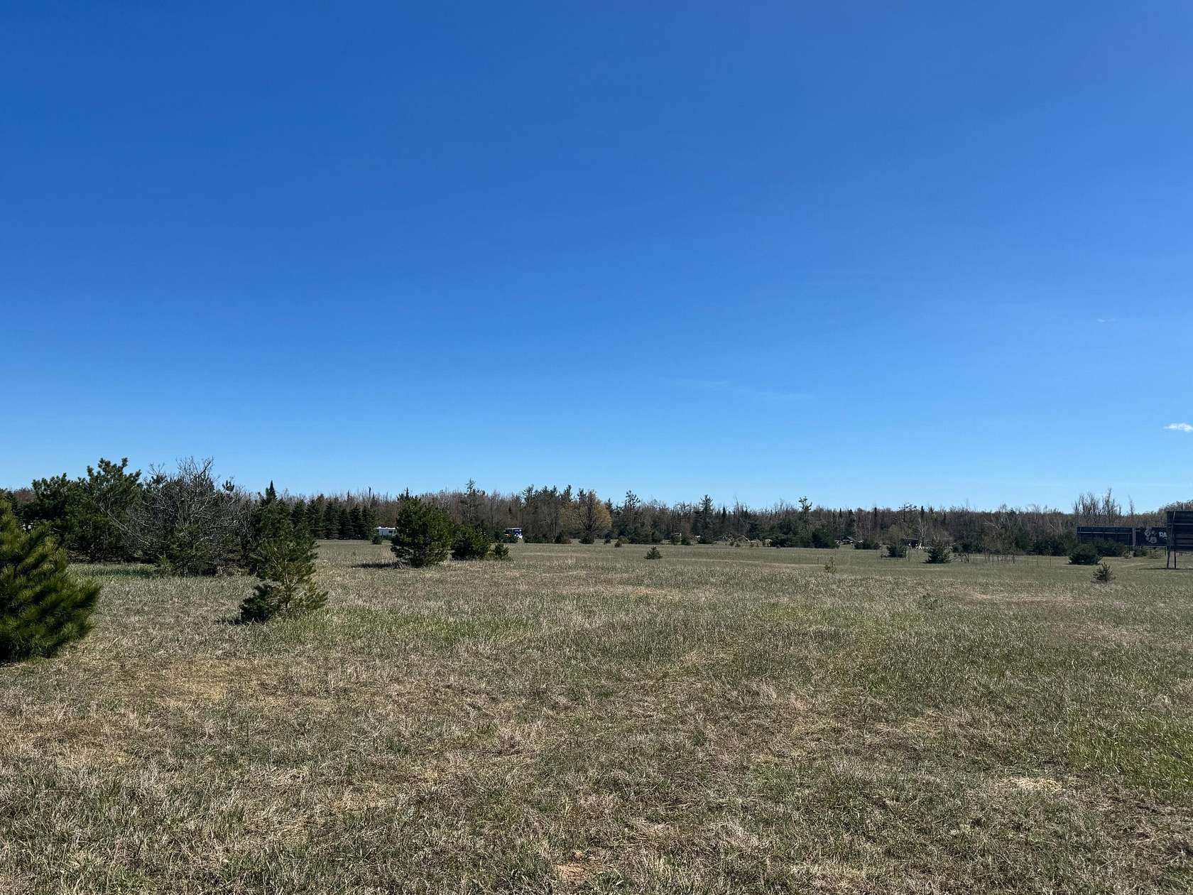 29.7 Acres of Commercial Land for Sale in Vanderbilt, Michigan