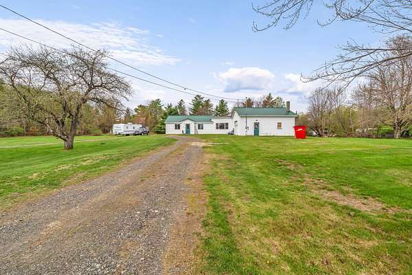 13.5 Acres of Land with Home for Sale in Troy, Maine