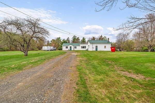 13.5 Acres of Land with Home for Sale in Troy, Maine