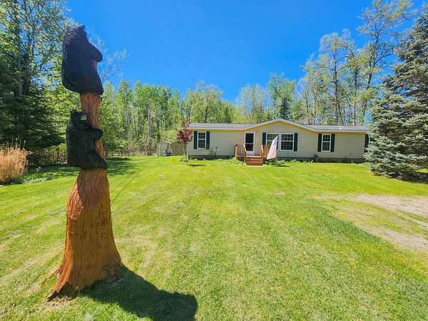 4 Acres of Land with Home for Sale in Houghton Lake, Michigan