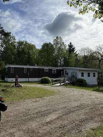 5 Acres of Land with Home for Sale in Big Rapids, Michigan