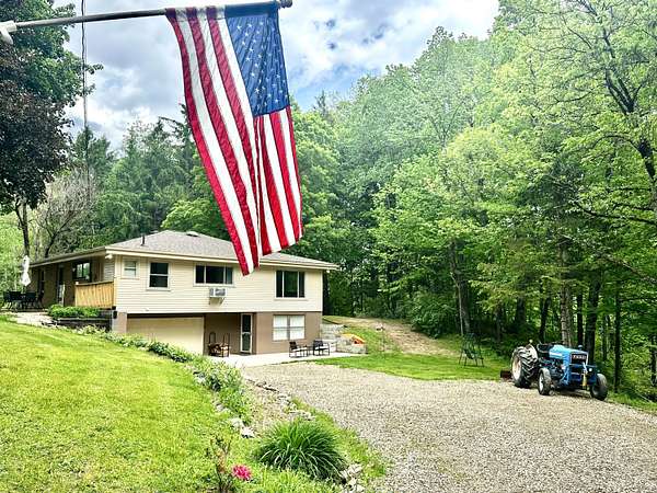 24.6 Acres of Recreational Land with Home for Sale in Paw Paw, Michigan