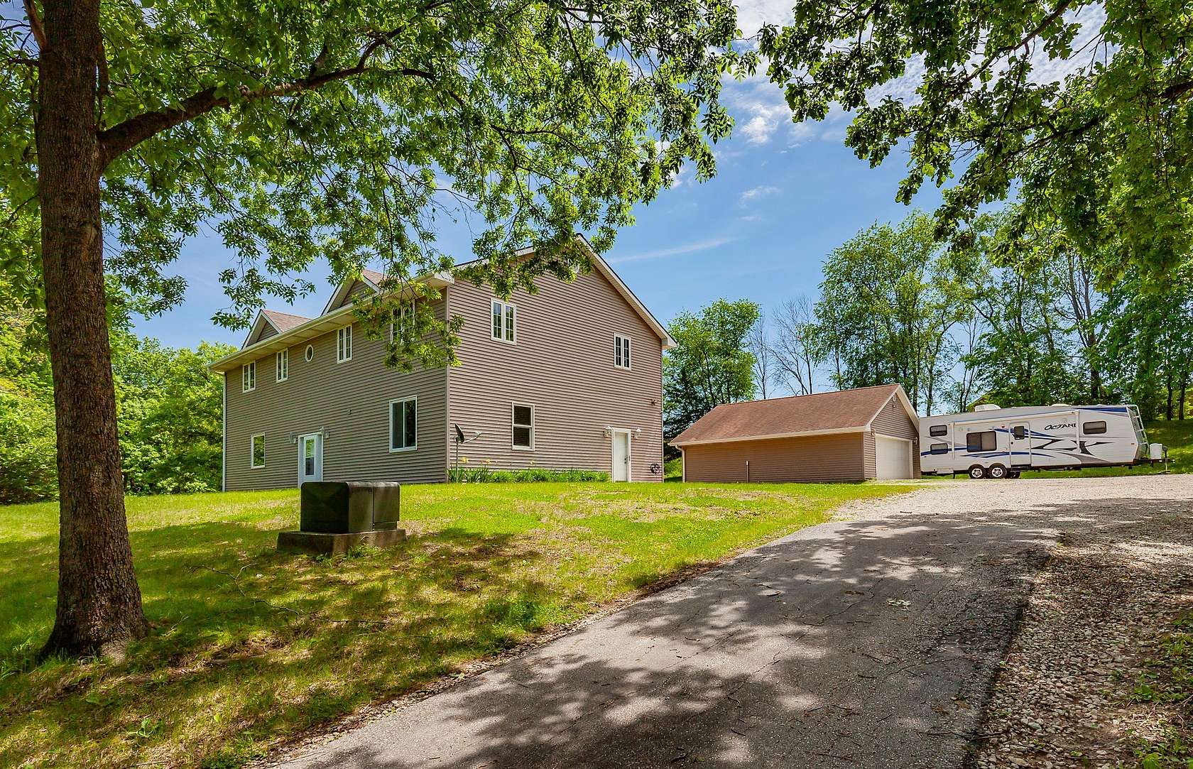 6.24 Acres of Land with Home for Sale in Norwalk, Iowa