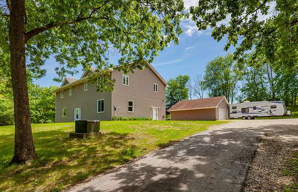 6.24 Acres of Land with Home for Sale in Norwalk, Iowa