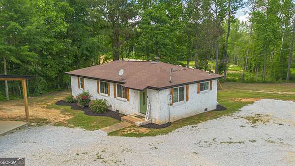 1.5 Acres of Land with Home for Sale in Heflin, Alabama