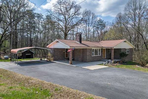 5.3 Acres of Land with Home for Sale in Warne, North Carolina