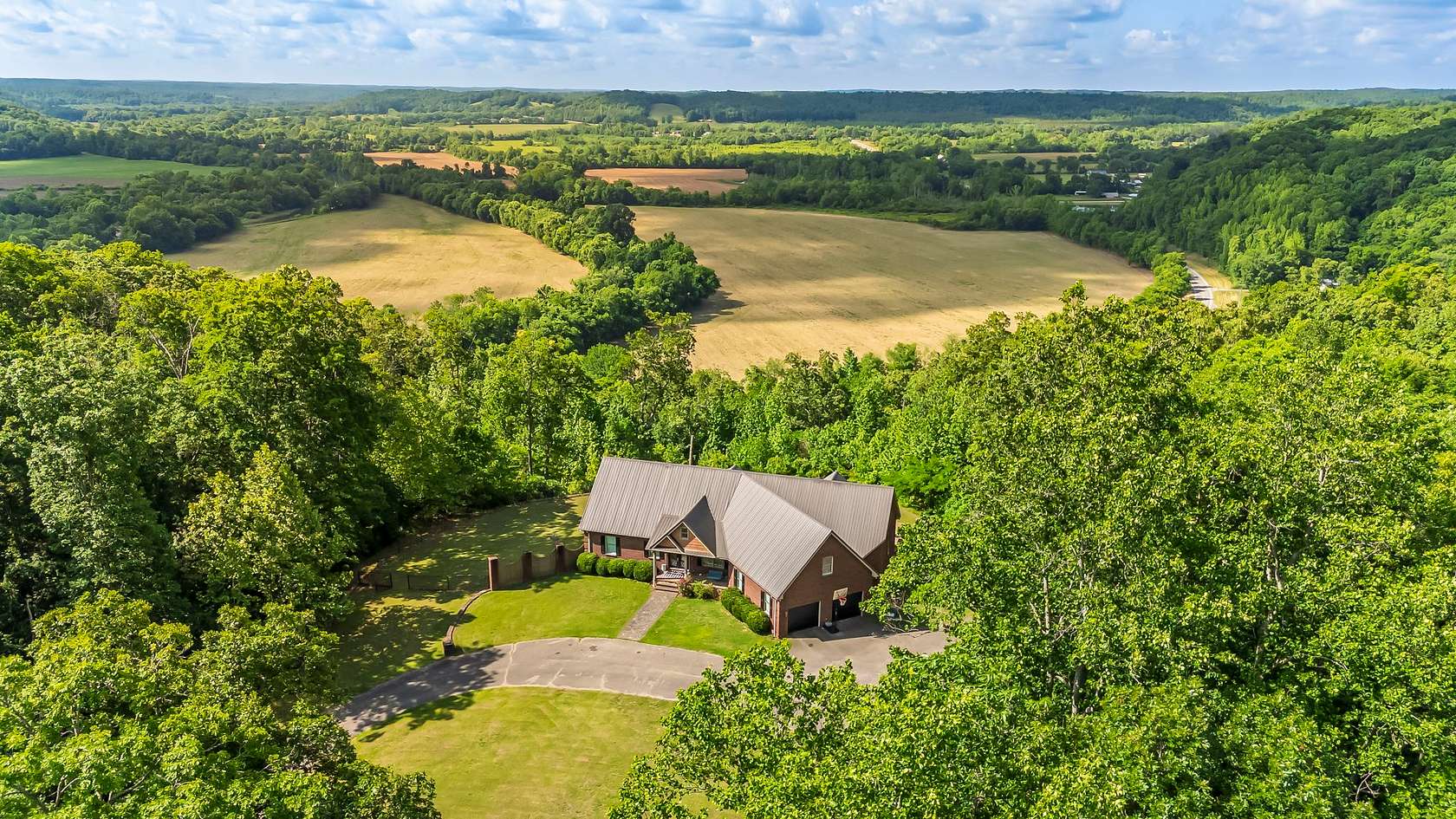 52 Acres of Recreational Land with Home for Sale in Lobelville, Tennessee