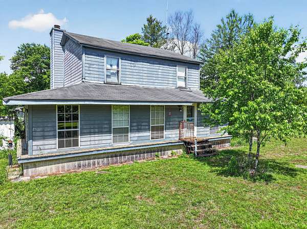 6.18 Acres of Land with Home for Auction in Readyville, Tennessee
