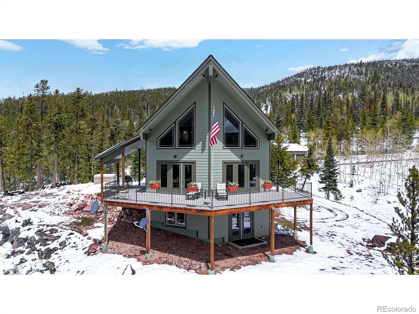 13.9 Acres of Recreational Land with Home for Sale in Red Feather Lakes, Colorado