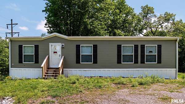 5.75 Acres of Land with Home for Sale in Marion, Illinois