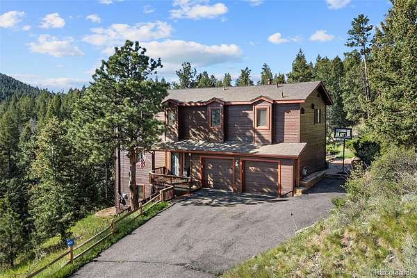 2 Acres of Land with Home for Sale in Evergreen, Colorado