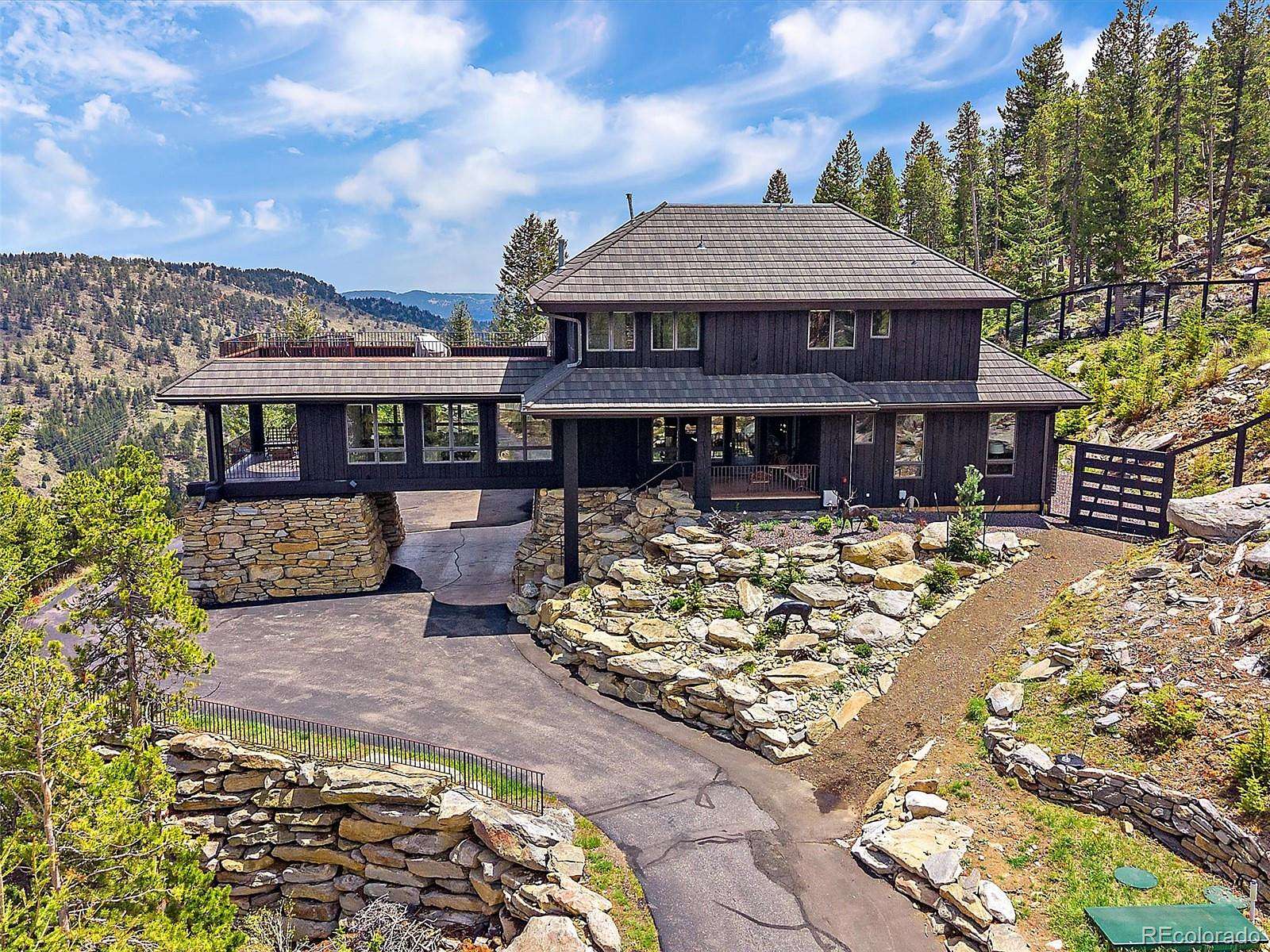 5.74 Acres of Land with Home for Sale in Evergreen, Colorado