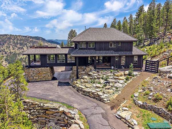 5.74 Acres of Land with Home for Sale in Evergreen, Colorado