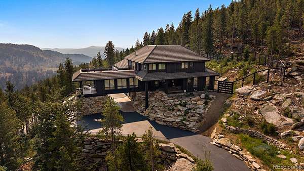 5.74 Acres of Land with Home for Sale in Evergreen, Colorado
