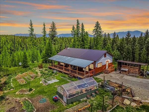 5 Acres of Land with Home for Sale in Fortine, Montana