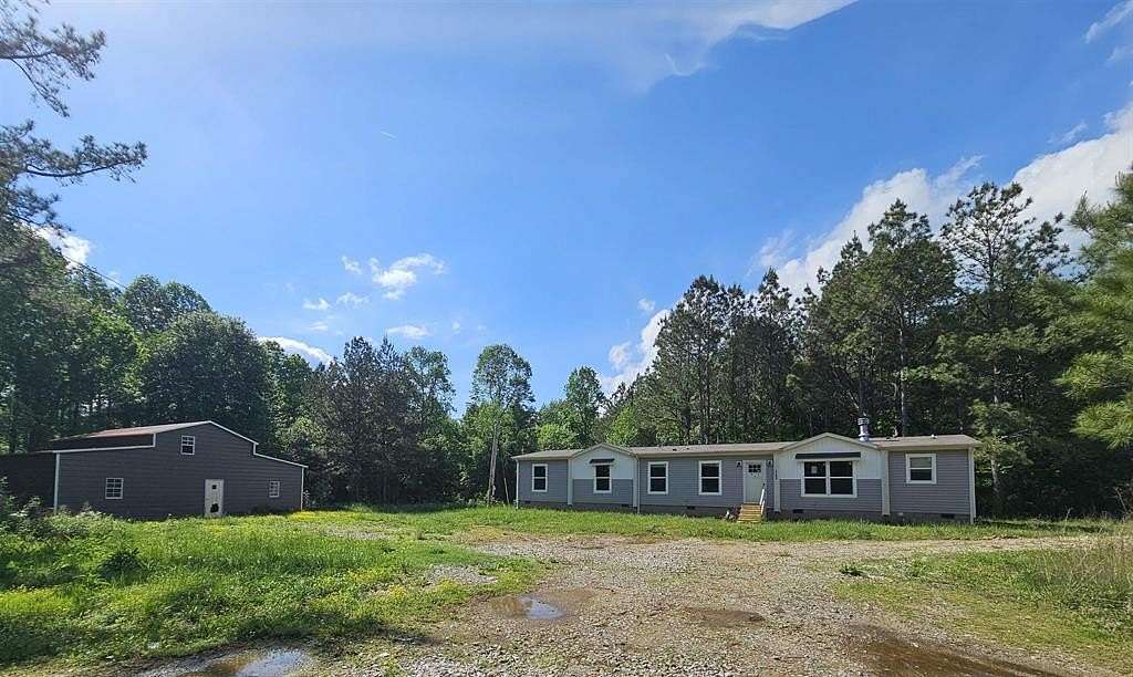 6.8 Acres of Land with Home for Sale in Fordsville, Kentucky