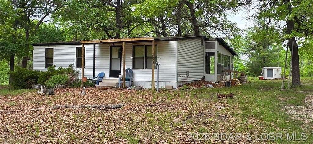 2.8 Acres of Land with Home for Sale in Roach, Missouri
