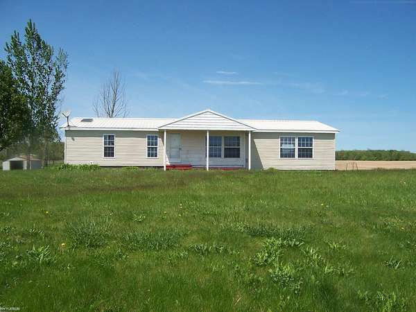 5 Acres of Land with Home for Sale in Greenwood Township, Michigan