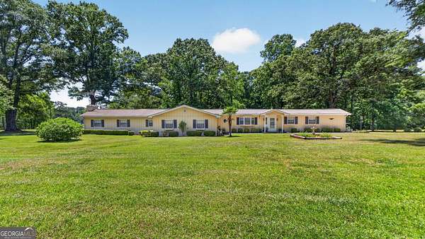 7.63 Acres of Land with Home for Sale in Jackson, Georgia