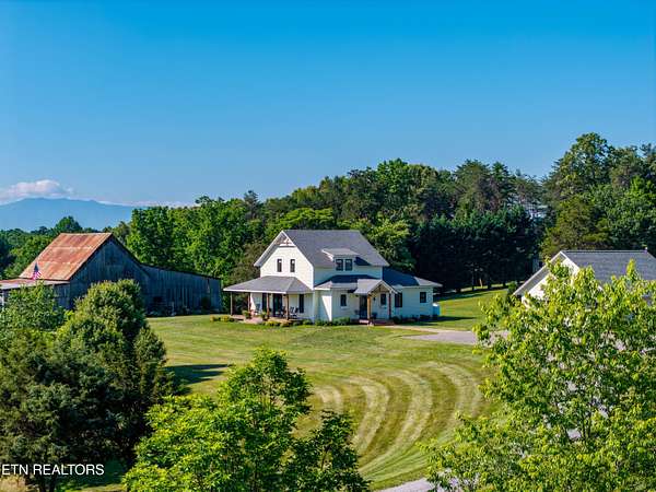4.69 Acres of Land with Home for Sale in Dandridge, Tennessee