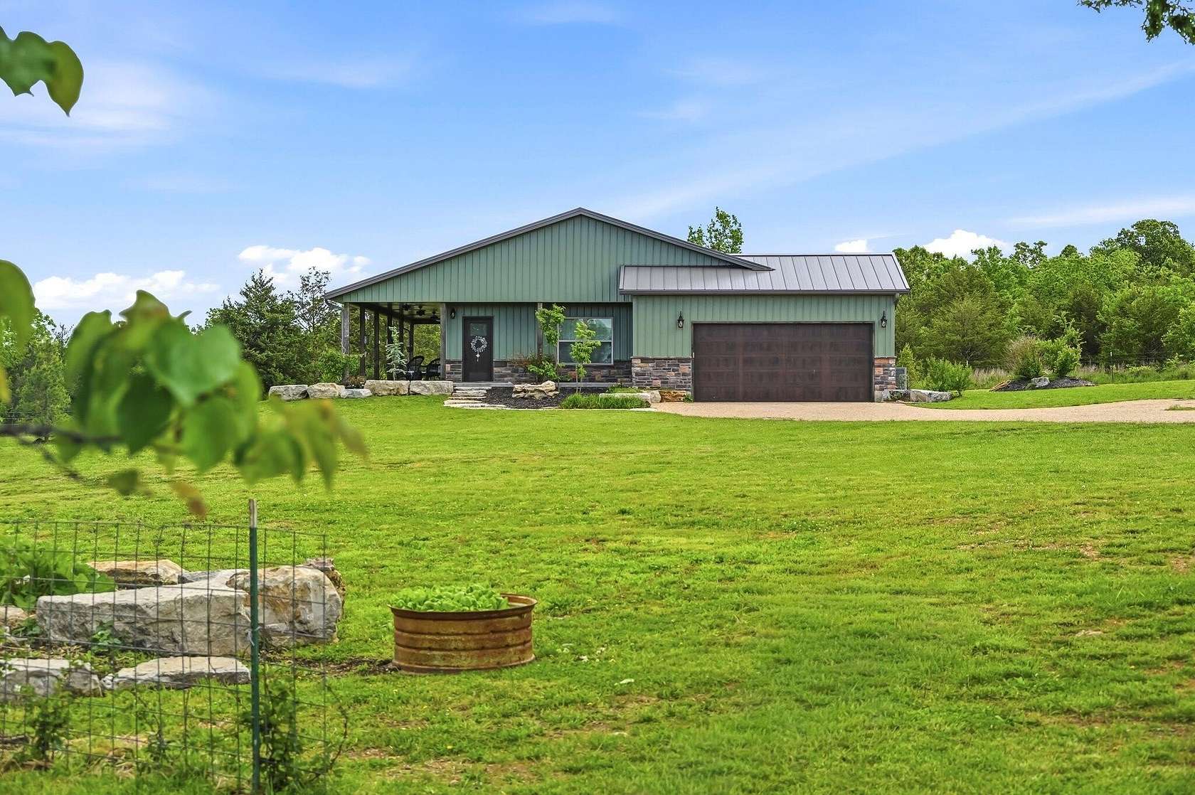 50 Acres of Agricultural Land with Home for Sale in Aurora, Missouri