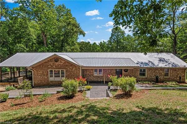 6.35 Acres of Land with Home for Sale in Harmony, North Carolina