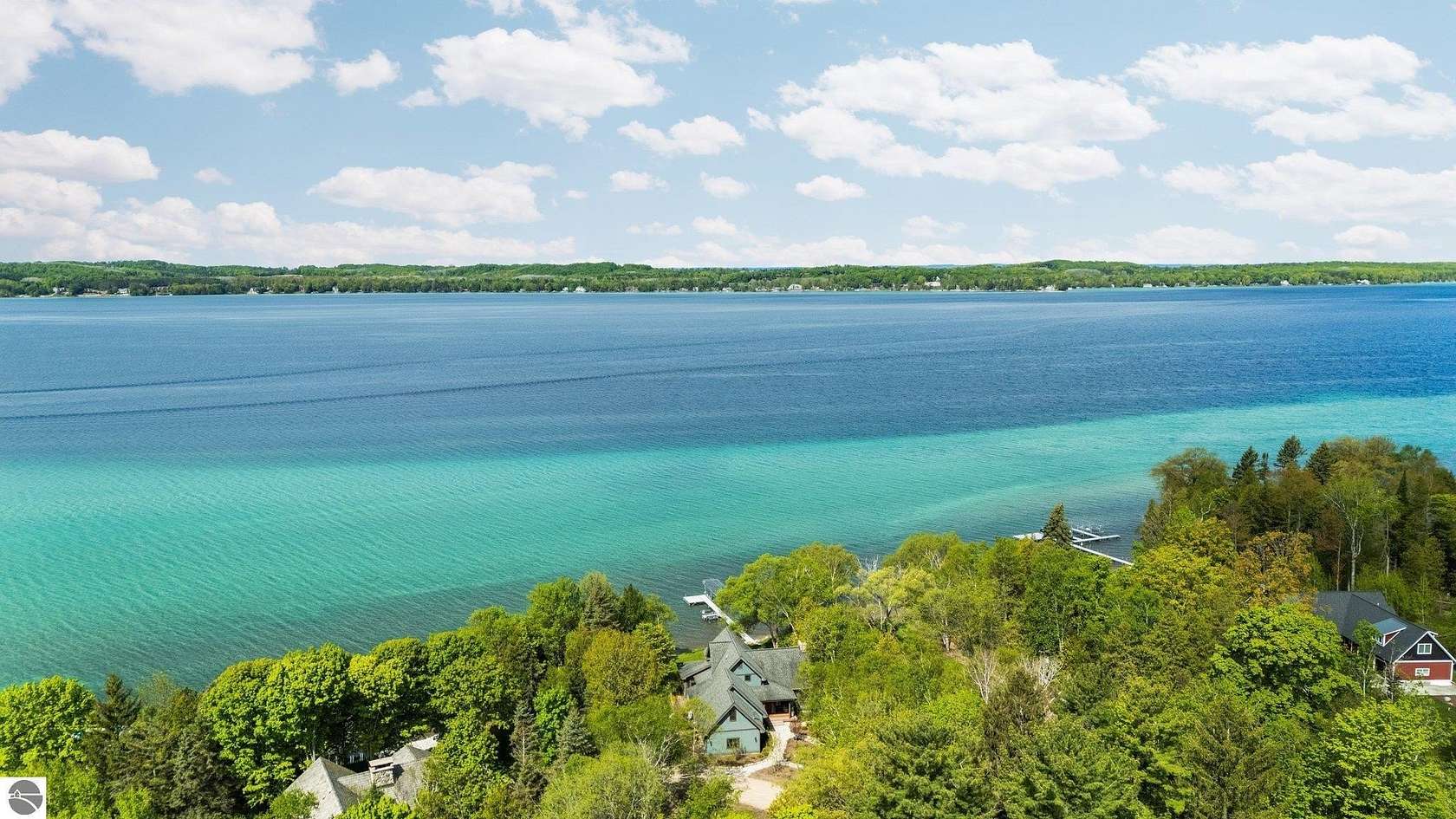 3.58 Acres of Land with Home for Sale in Bellaire, Michigan