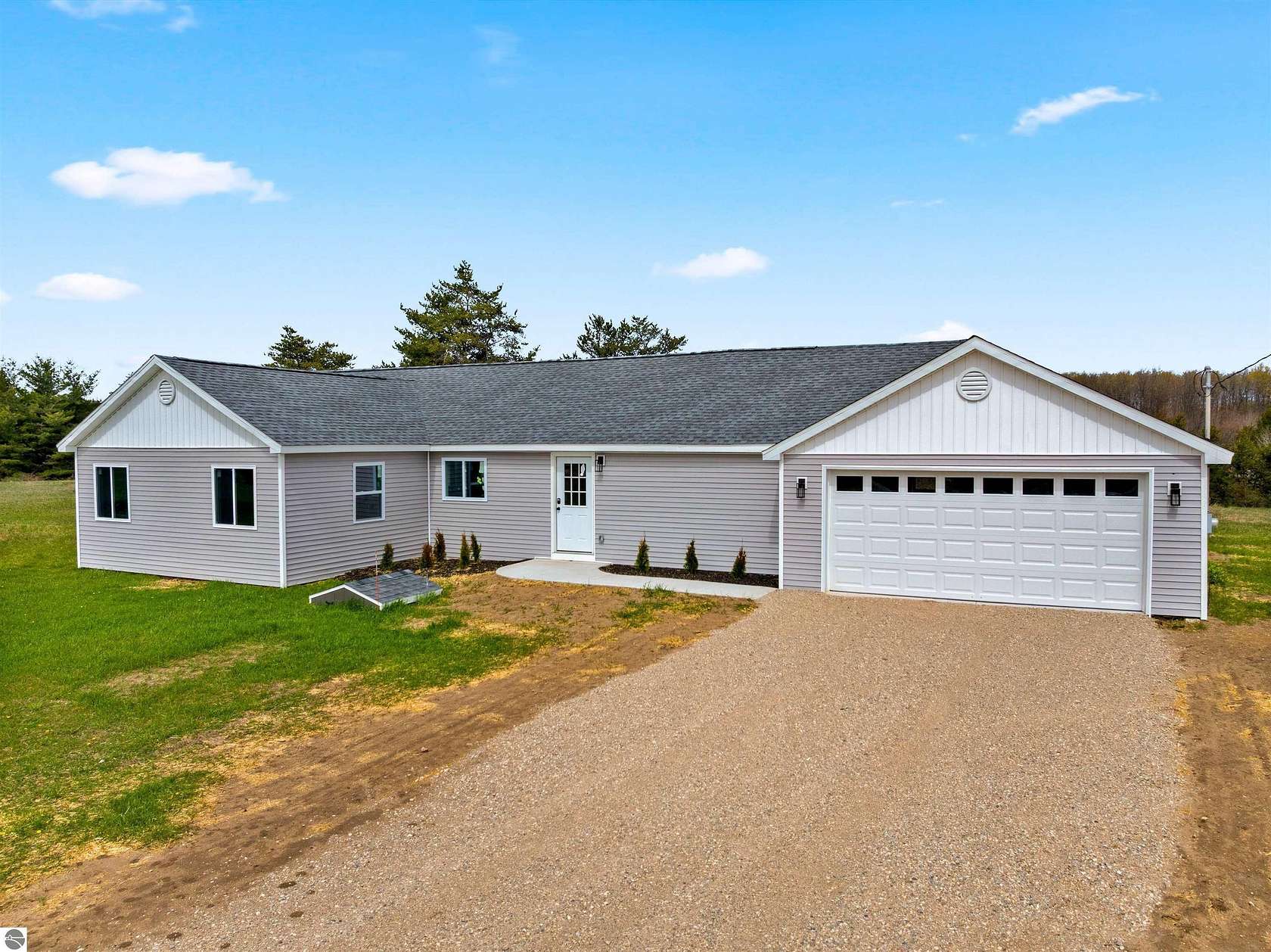 8 Acres of Land with Home for Sale in Mancelona, Michigan