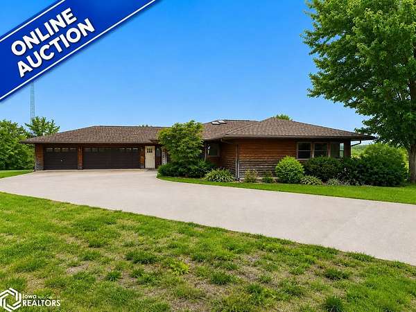 12.2 Acres of Land with Home for Auction in Montrose, Iowa
