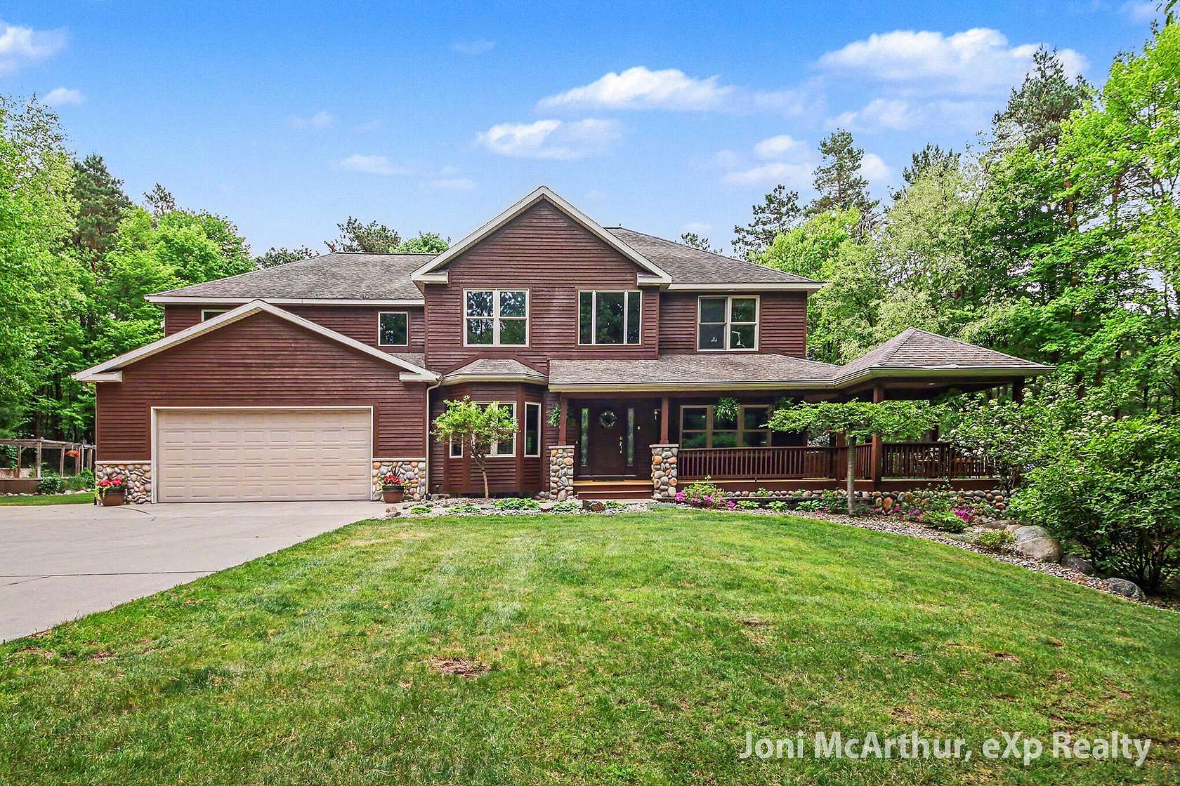 2 Acres of Land with Home for Sale in Belmont, Michigan