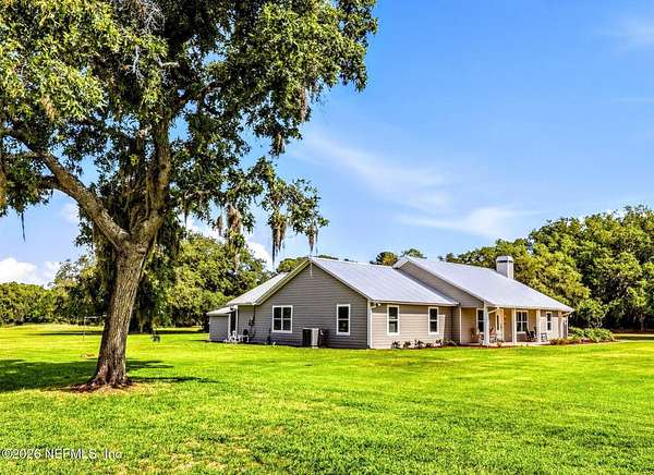 22.8 Acres of Land with Home for Sale in San Mateo, Florida