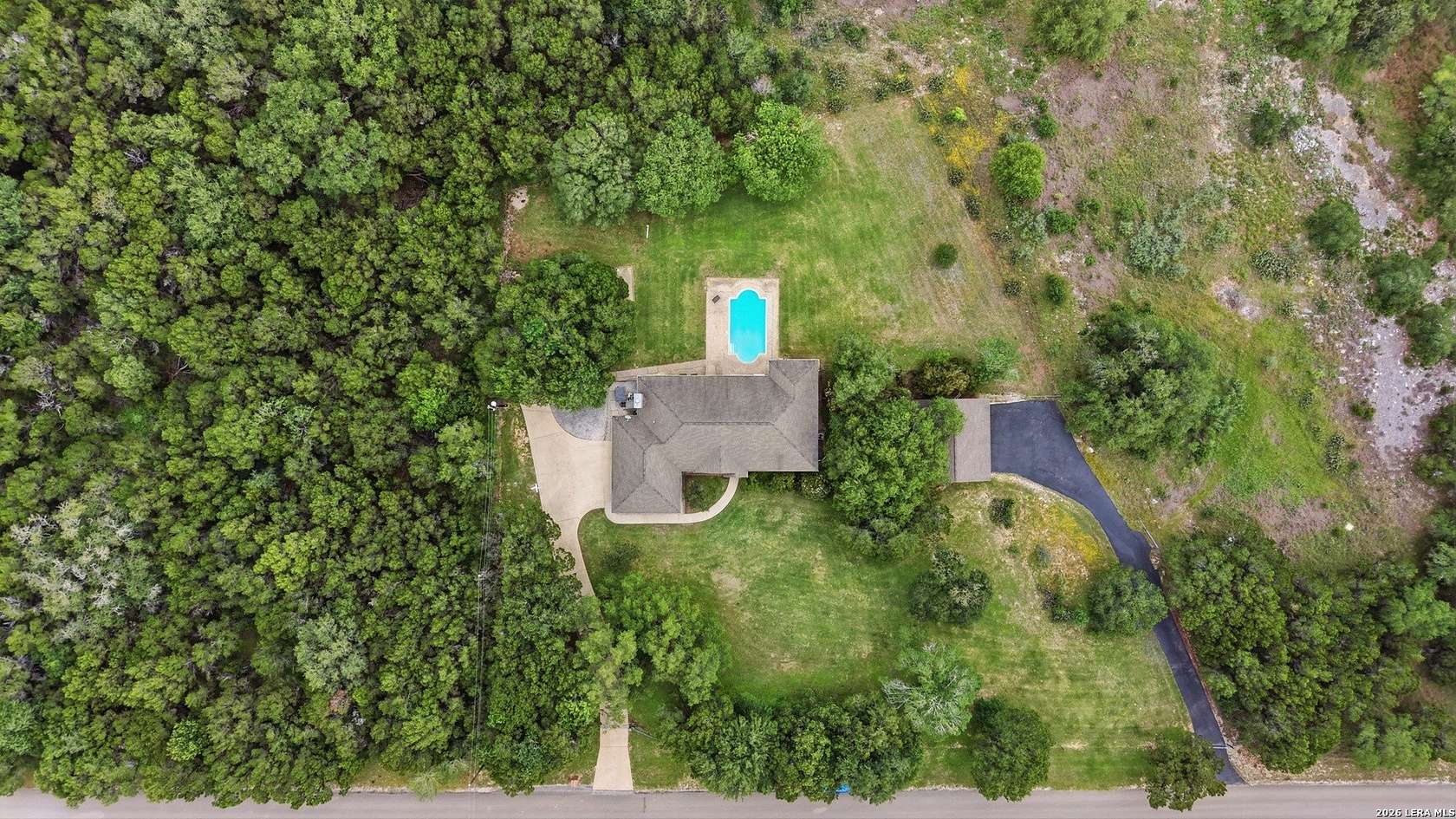 7.68 Acres of Land with Home for Sale in New Braunfels, Texas