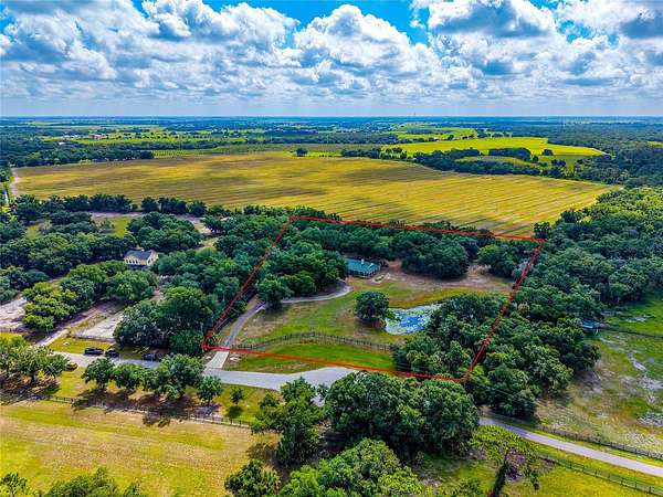 5.18 Acres of Land with Home for Sale in Myakka City, Florida